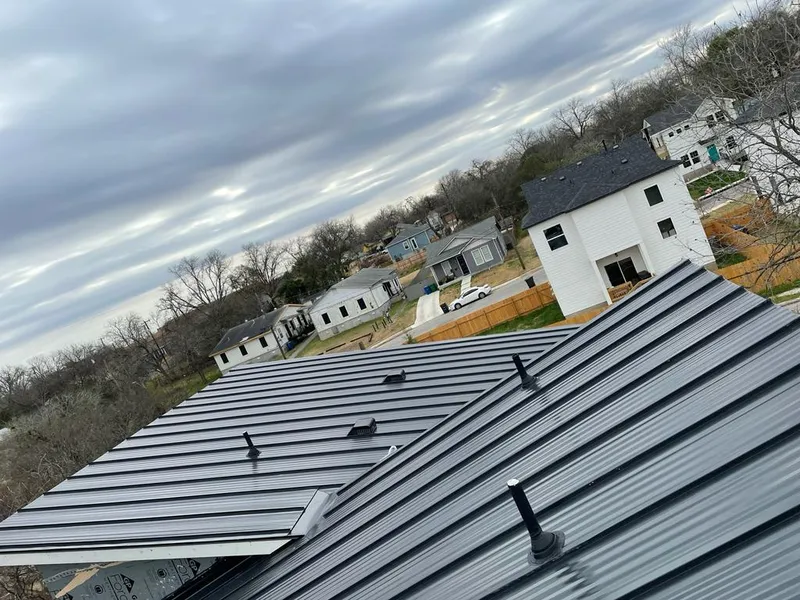 Standing seam metal roof panels with vents for Skylight Repair in Grain Valley